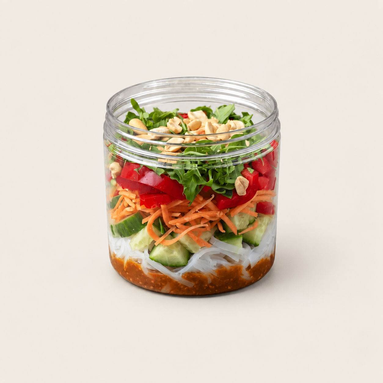 Fresh Thai glass noodle salad jar with vegetables, rocket and cashews